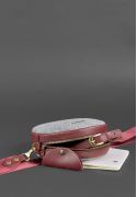 Фото Круглая фетровая женская сумка Таблетка с кожаными бордовыми вставками