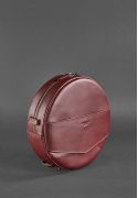 Фото Кожаная женская круглая сумка-рюкзак Maxi бордовая