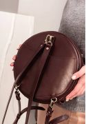Фото Кожаная женская круглая сумка-рюкзак Maxi бордовая